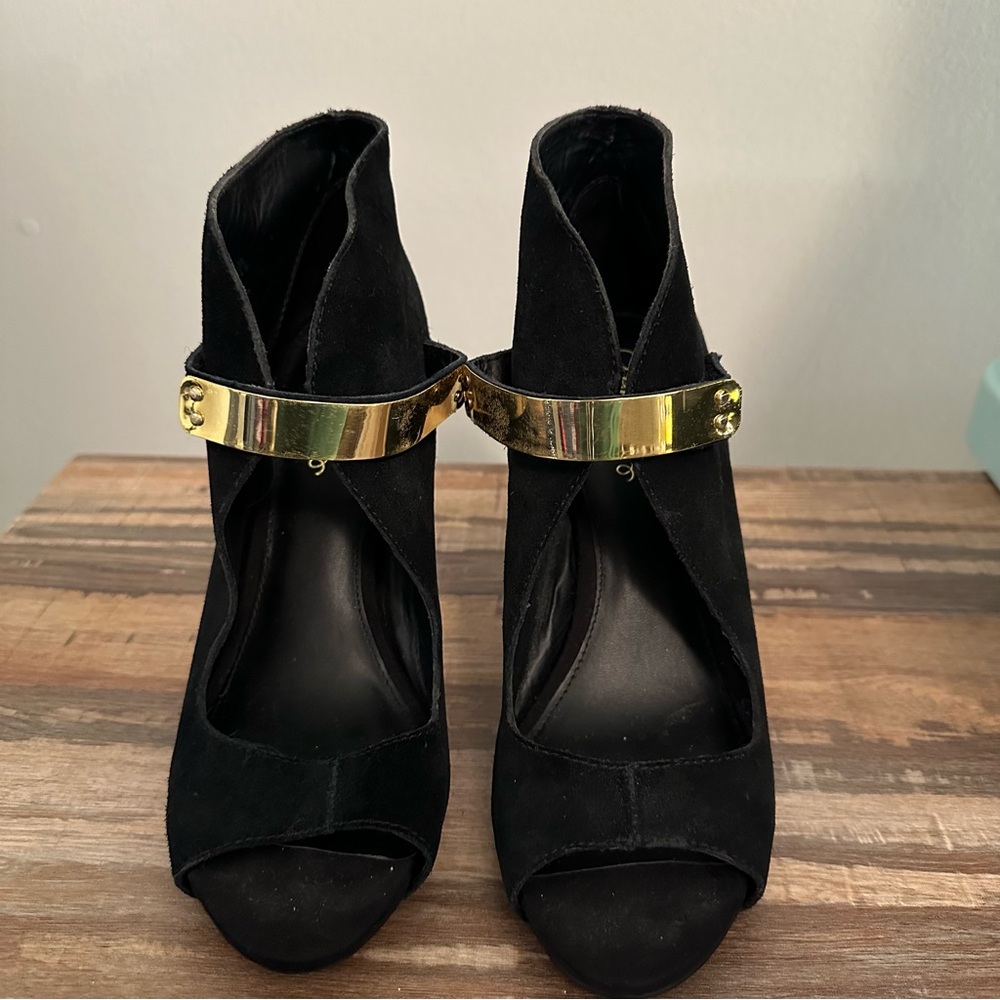 Fergie faux suede black pumps with gold strap